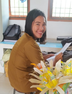 <center>Pengurus Barang/Staf TU<br>Adriani Pasaribu, SE</center>